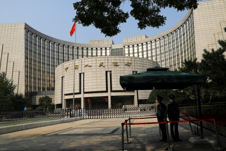 China’s central bank buys government bonds, stirs intervention talk